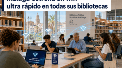 Biblioteca pública de Málaga con usuarios usando wifi ultra rápido.