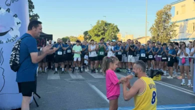 Corredores en la III Carrera Solidaria 'Un mar de alegría' en Sanlúcar.