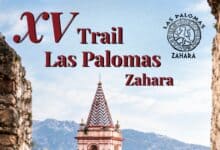 Cartel del XV Trail Las Palomas Zahara con paisaje montañoso de fondo.
